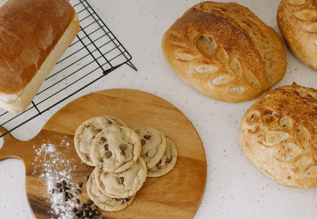 Fresh sourdough loaves and chocolate chip cookies from Sugar Street, ready to share.